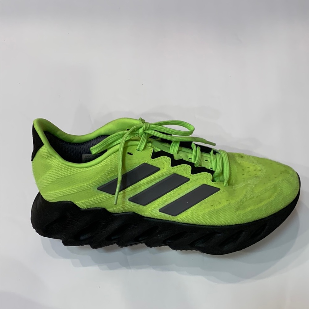 Adidas Green and Black Athletic Shoes with Performance Cushioning